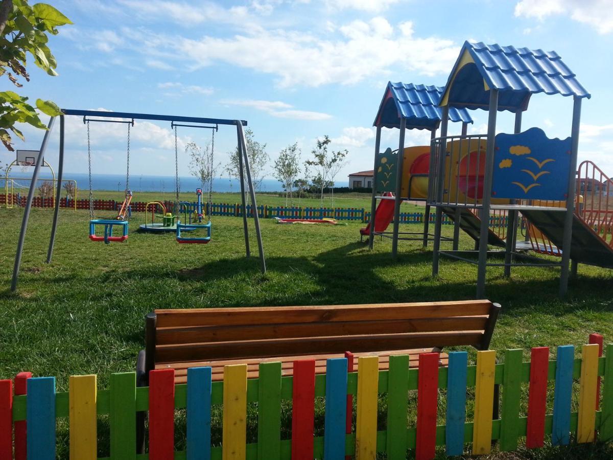 Lighthouse Golf & Spa Hotel Baltsjik Buitenkant foto Playground in the village